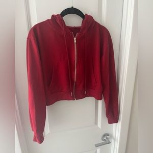 Cropped red zip-up sweatshirt